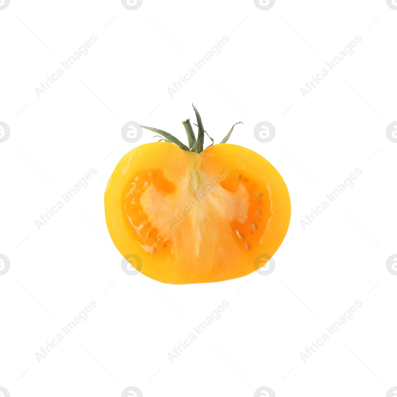 Piece of delicious ripe yellow tomato isolated on white Photo of Piece of delicious ripe yellow tomato isolated on white