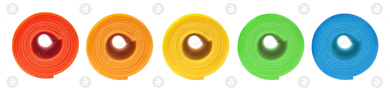 Set with different bright rolled camping mats on white background. Banner design Image of Set with different bright rolled camping mats on white background. Banner design